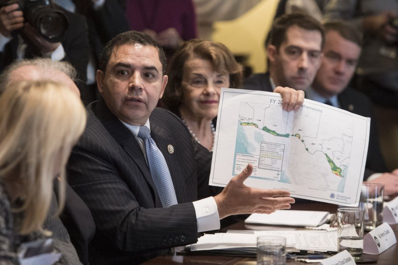 Rep. Henry Cuellar, R-Texas, holds up a map related to the border wall during a congressional meeting on immigration in 2018. Cuellar's ties to Azerbaijan are now under scrutiny. File Photo by Kevin Dietsch/UPI