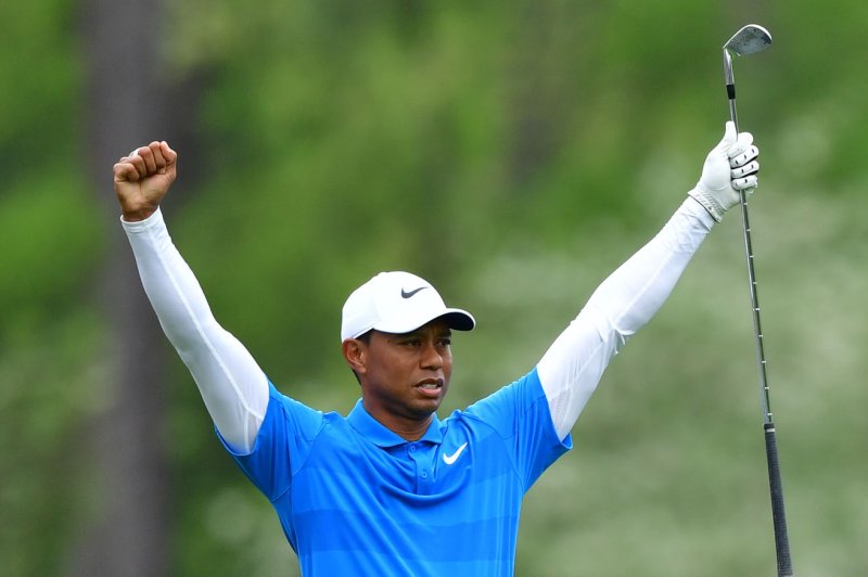 Tiger Woods holes out for eagle at Memorial