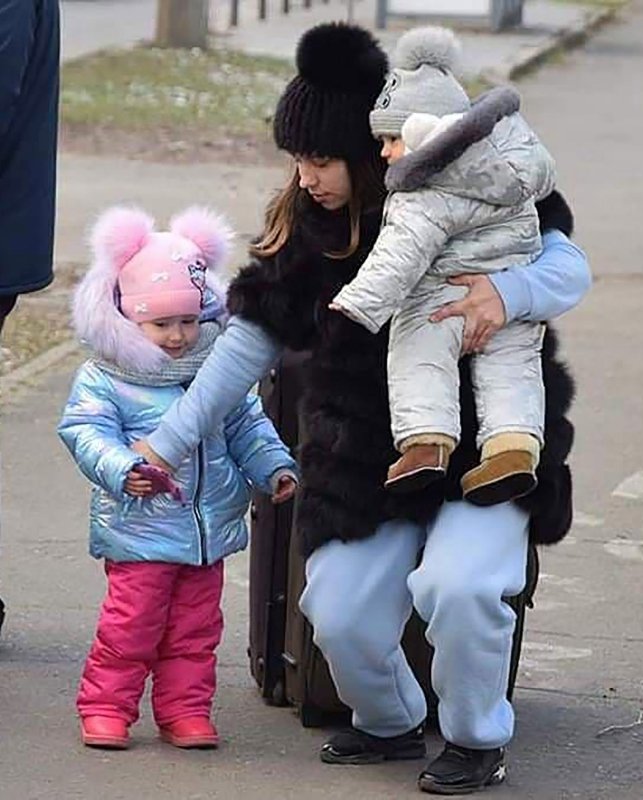 A woman and her children are evacuated from areas surrounding the Ukrainian capital of Kyiv on March 10. Experts say that criminals are exploiting the desperation in Ukraine -- often posing as relief workers or volunteers -- to target victims for various trafficking operations. Photo courtesy of&nbsp; Ukrainian State Emergency Service/UPI | <a href="/News_Photos/lp/03d81403bad8d06e3e22b8b38f8f14a9/" target="_blank">License Photo</a>