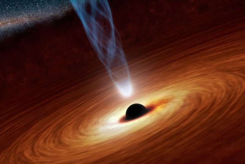 An artist's rendering shows a supermassive black hole at the center of a galaxy. File photo by UPI/NASA