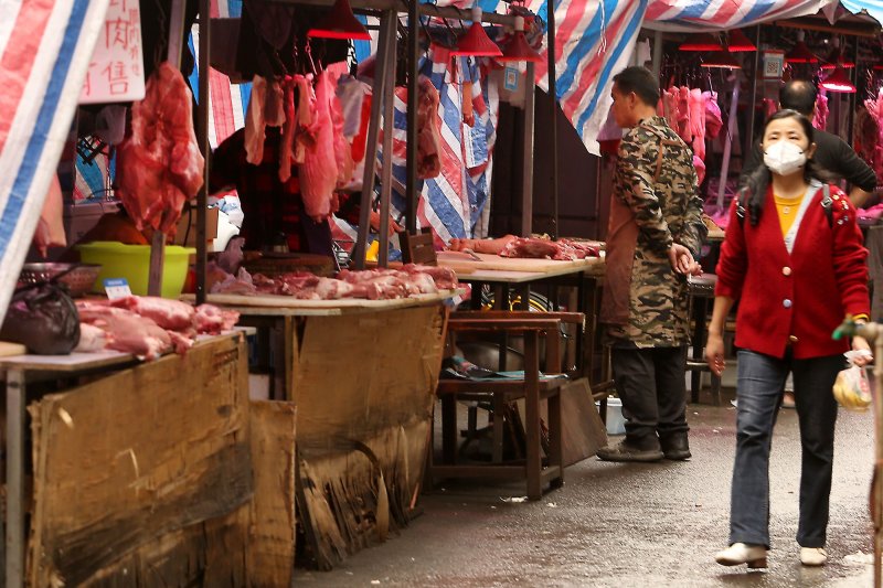 Fresh pork is sold at a neighborhood wet market in Wuhan, the capital of Hubei province, on November 1. A U.S. intelligence report said U.S. agencies are uncertain whether COVID-19 originated in a Wuhan wet market or an accident at a laboratory. File Photo by Stephen Shaver/UPI