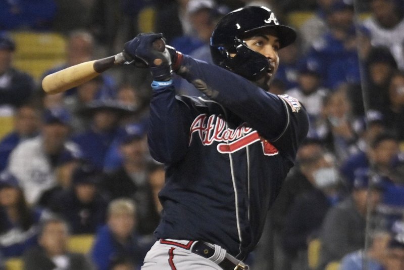 Atlanta Braves left fielder Eddie Rosario hits a three-run home run against the Los Angeles Dodgers in the ninth inning in Game 4 of the NLCS on Wednesday at Dodger Stadium in Los Angeles. Photo by Jim Ruymen/UPI