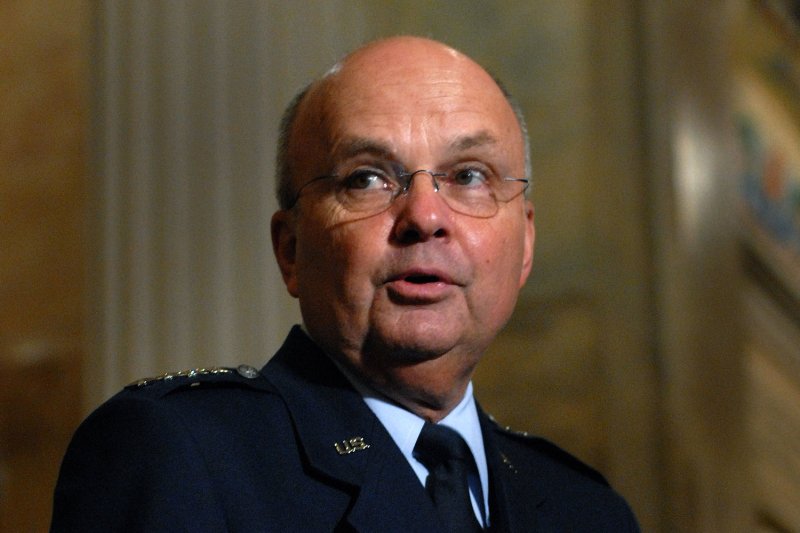 Former CIA director Michael Hayden accused GOP front-runners Donald Trump and Sen. Ted Cruz, R-Texas, of reducing complex national security and foreign policy issues into "bumper stickers." (UPI Photo/Kevin Dietsch)