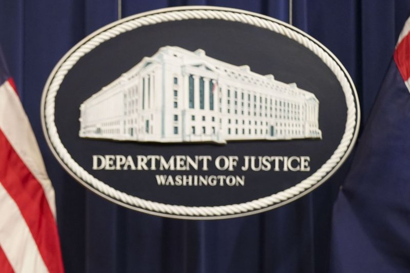 An image of the Department of Justice sign during a press conference with Australian Minister for Home Affairs Karen Andrews and Attorney General Merrick Garland on December 15, 2021. The Justice Department announced Tuesday it is created a domestic terrorism task force. Photo by Leigh Vogel/UPI
