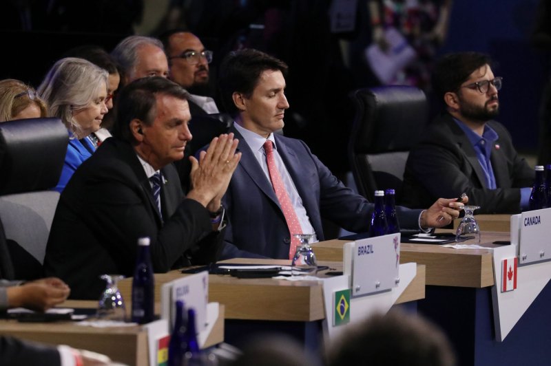 Canada and Denmark formally settled an almost 50-year dispute Wednesday over a tiny uninhabited island in the arctic, Canadian Prime Minister Justin Trudeau (C) confirmed. File Pool photo by David Swanson/UPI