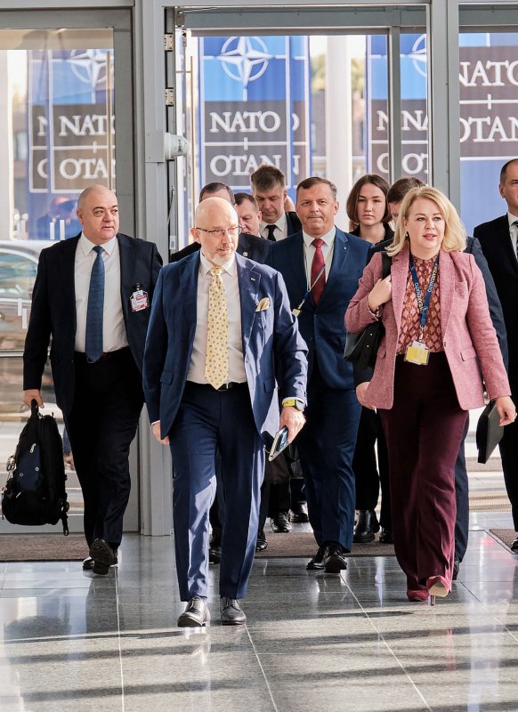 Ukrainian Defense Minister Oleksii Reznikov (C) arrives to attend the NATO defense ministers meeting in Brussels, Belgium, on Wednesday. Defense ministers of NATO member states met on Wednesday in Brussels to discuss ways to provide military aid for Ukraine. Photo by NATO/UPI