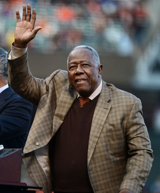 Hall of Famer Hank Aaron waves to fans before Game 4 of the 2014 World Series between the San Francisco Giants and Kansas City Royals, at AT&amp;T Park in San Francisco, Calif., on October 25, 2014. File Photo by Terry Schmitt/UPI | <a href="/News_Photos/lp/34f3e0340cc1aa05fda7f2a5e3187943/" target="_blank">License Photo</a>