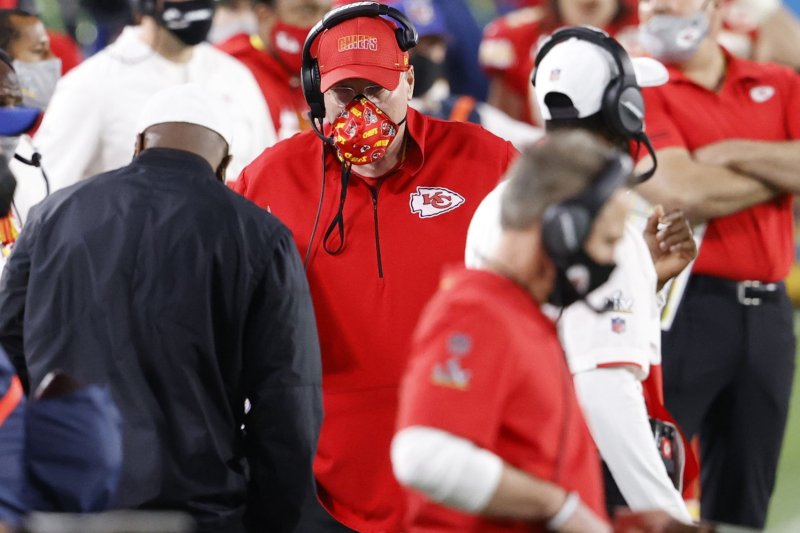Former Kansas City Chiefs linebackers coach Britt Reid was not on the sideline with his brother, and Chiefs coach Andy Reid (C), during Super Bowl LV because he was involved in a car crash in Kansas City, Mo., days before the Feb. 7 game in Tampa, Fla. File&nbsp;Photo by John Angelillo/UPI