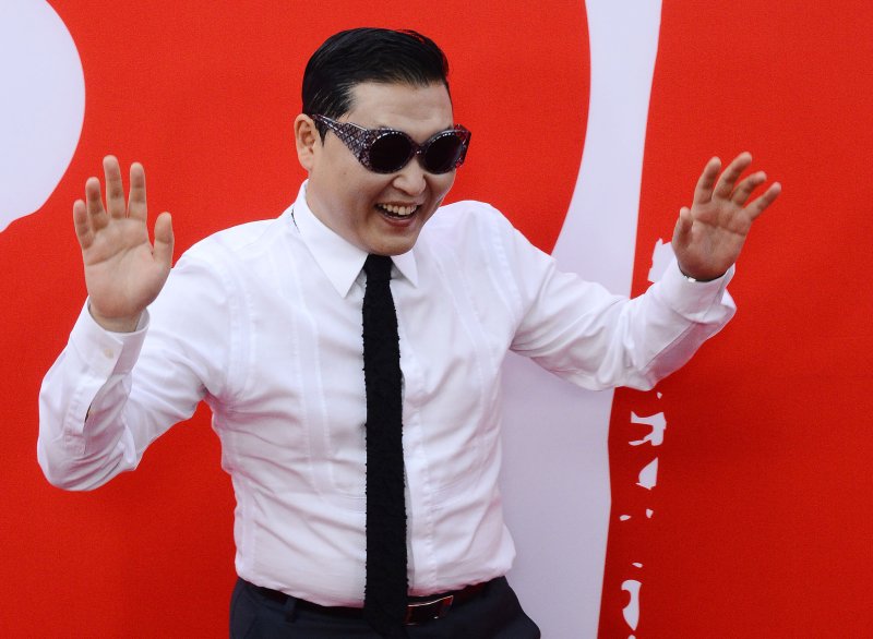 South Korean actor PSY attends the premiere of "Red 2" at the Westwood Village Theatre in the Westwood section of Los Angeles on July 11, 2013. In this sequel, retired black-ops CIA agent Frank Moses reunites his unlikely team of elite operatives for a global quest to track down a missing portable nuclear device. UPI/Jim Ruymen | <a href="/News_Photos/lp/ed15efef8e0fe71ccc868e9ef184c9c6/" target="_blank">License Photo</a>