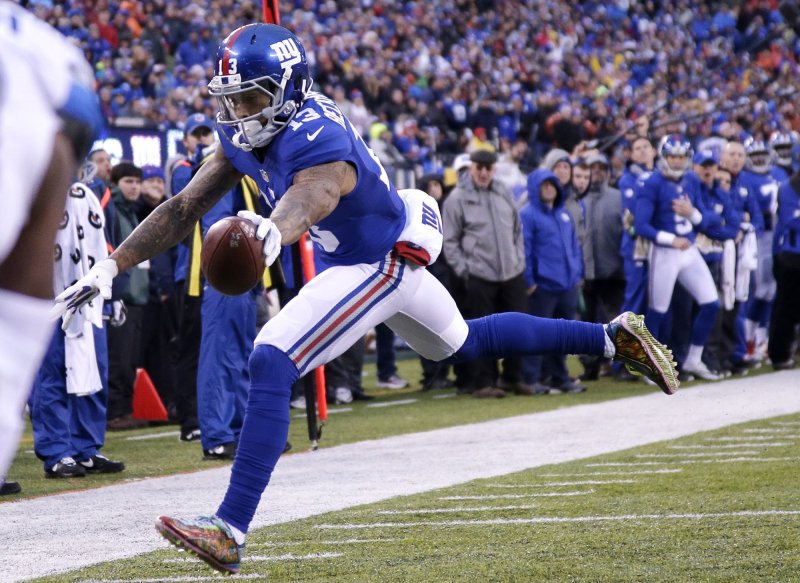New York Giants wide receiver Odell Beckham Jr. reaches the ball across the goal line for a touchdown vs. the Detroit Lions in 2016. Photo by John Angelillo/UPI