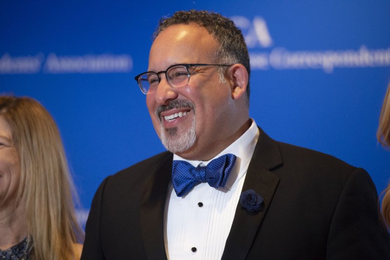 Education Secretary Miguel Cardona arrives at the 2022 White House Correspondents' Association Dinner at the Washington Hilton on April 30. He announced loan discharges for ITT Institute students on Tuesday. File Photo by Bonnie Cash/UPI | <a href="/News_Photos/lp/e149814c9078744982a9b0f13b4ad931/" target="_blank">License Photo</a>