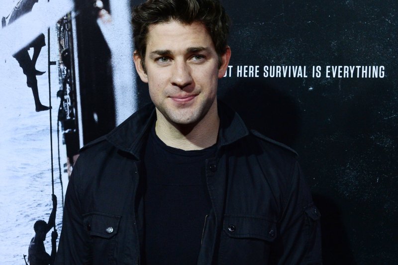 Actor John Krasinski at the premiere of "Captain Phillips" in Beverly Hills on September 30, 2013. Krasinski co-stars in "13 Hours," the account of the 2012 attack on the American consulate in Benghazi, based on the book by Mitchell Zuckoff. Photo by Jim Ruymen/UPI | <a href="/News_Photos/lp/84716403dfe0834fb8255a86696098fb/" target="_blank">License Photo</a>