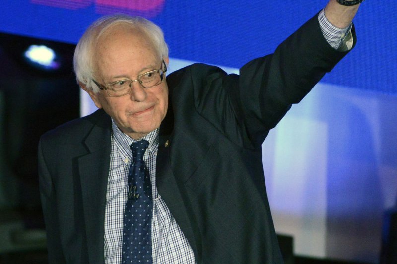 Bernie Sanders waves as he arrives at the Iowa Brown & Black Forum on January 11, 2016, at Drake University in Des Moines, Iowa. The forum, which also included Democratic candidates Hillary Clinton and former Maryland Gov. Martin O'Malley, addresses concerns of African-Americans and Latinos. Photo by Mike Theiler/UPI