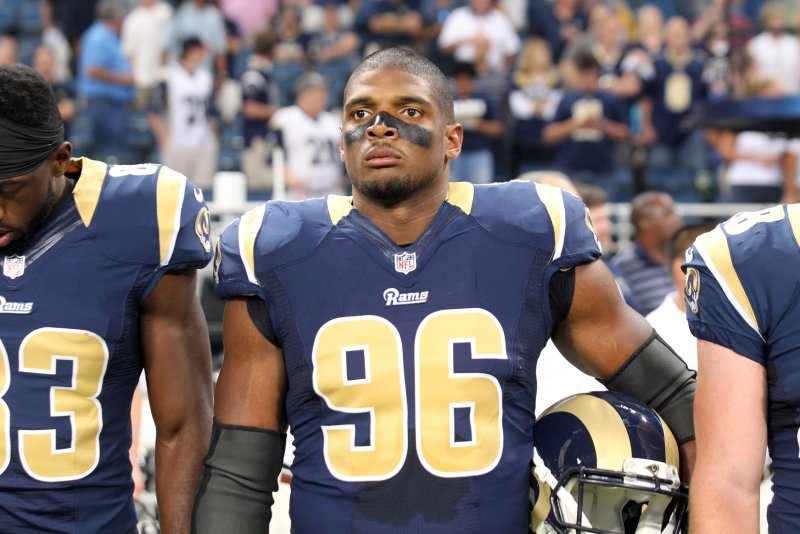 St. Louis Rams Michael Sam stands for the National Anthem before a game against the New Orleans Saints at the Edward Jones Dome in St. Louis on August 8, 2014. UPI/Bill Greenblatt | <a href="/News_Photos/lp/422bafe089ae1c0003f4d945fa720a31/" target="_blank">License Photo</a>