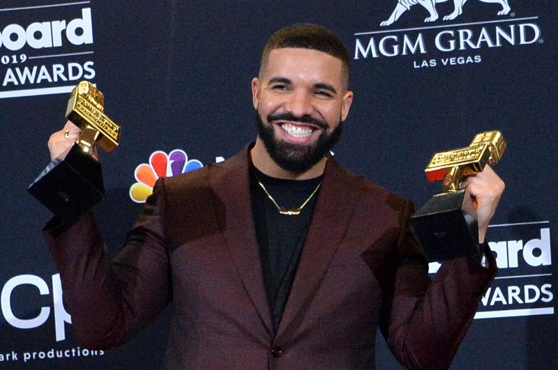 Drake appears backstage after winning the awards for Top Artist, Top Male Artist and Top Billboard 200 Album for "Scorpion" during the Billboard Music Awards in Las Vegas in 2019. The rap star and 21 Savage have settled a lawsuit with Vogue magazine. File Photo by Jim Ruymen/UPI