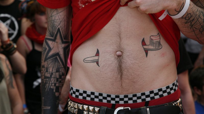 A festival attendee displays his tattoo during the Tattoo Art Festival at Parc Floral in Paris on April 28, 2007. (UPI Photo/ David Silpa)