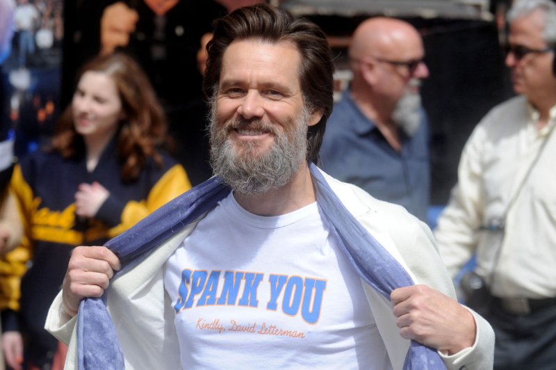 Jim Carrey arrives at the backstage entrance before the final taping of the "Late Show," with David Letterman at The Ed Sullivan Theater in New York City on May 20, 2015. Carrey is facing a second wrongful death lawsuit following his ex-girlfriend's suicide last year. File Photo by Dennis Van Tine/UPI