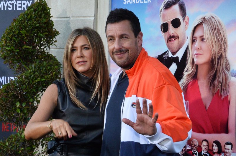 Adam Sandler (R) and Jennifer Aniston reprise Nick and Audrey Spitz in "Murder Mystery 2." File Photo by Jim Ruymen/UPI