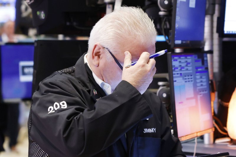 Traders work on the floor of the New York Stock Exchange on Wall Street in New York City on May 9. Tuesday's report said that producer prices in the month of May were 10.8% higher than they were a year ago. File Photo by John Angelillo/UPI