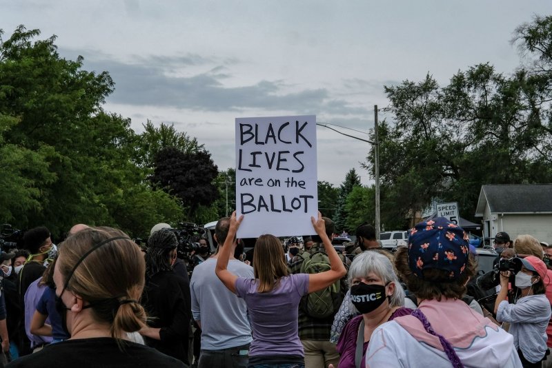 Black Lives Matter supporters gather at the site where Jacob Blake was shot while President Trump visited Kenosha, Wis., on Tuesday. Photo by Alex Wroblewski/UPI