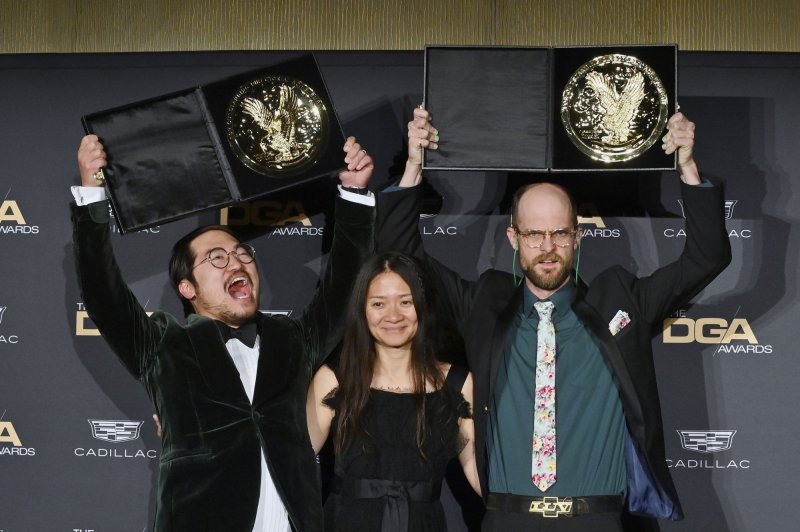 Chloe Zhao (C) poses with Dan Kwan (L) and Daniel Scheinert (R), winners of the Outstanding Directorial Achievement in Theatrical Feature Film award for "Everything Everywhere All at Once," in the press room during the 75th annual Directors Guild of America Awards at the Beverly Hilton in Beverly Hills, Calif., on February 18. File Photo by Jim Ruymen/UPI