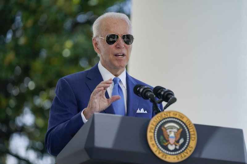 President Joe Biden speaks before signing two bills at the White House on Friday. Though he tested positive for COVID-19 again, he's continuing to work and maintain social distance and isolation. Pool Photo by Evan Vucci/UPI