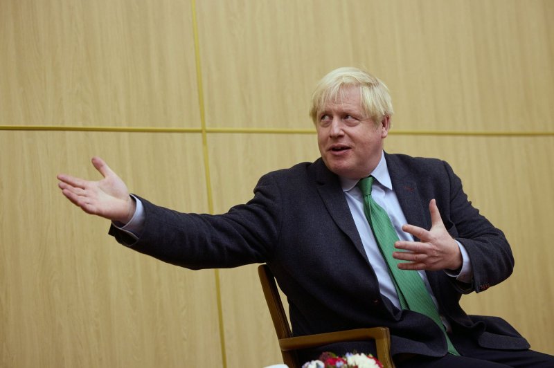 Former British Prime Minister Boris Johnson, who is due to submit himself to Parliament's Privileges Committee on Wednesday for questioning over lockdown parties, was forced to resign in July after a scandal-plagued two-and-half-years in office. File Photo via Ukrainian Presidential Press Office/UPI