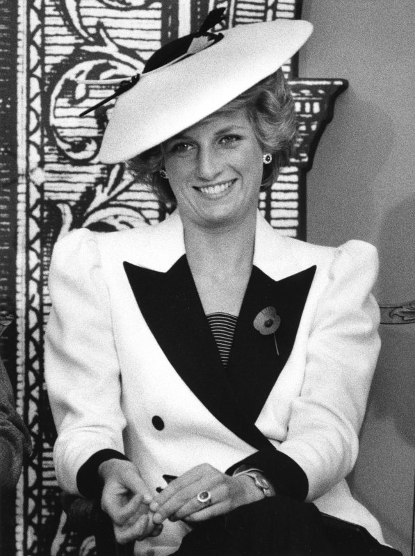 Princess Diana responds to reporters' questions after she and her husband Prince Charles toured the National Gallery of Art on November 10, 1985. Diana died in a car crash August 31, 1997. File Photo by Doug Mills/UPI | <a href="/News_Photos/lp/6df87749d9304361e6abcaae5857269d/" target="_blank">License Photo</a>