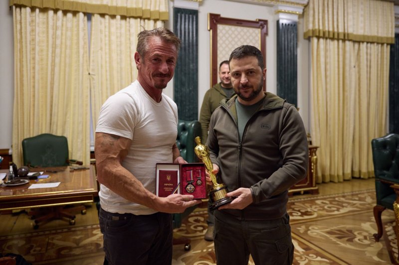 Ukrainian President Volodymyr Zelensky (R) meets with the Hollywood actor and philanthropist Sean Penn in Kyiv on Tuesday. Penn gave Zelensky one of his Oscars, "When you win, bring it back to Malibu." Photo courtesy of Ukrainian Presidential Press Office