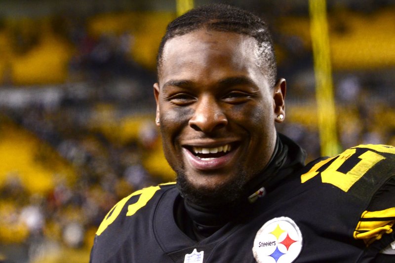 Pittsburgh Steelers running back Le'Veon Bell (26) runs off the field all smiles following the 31-27 win against the Baltimore Ravens. File photo by Archie Carpenter/UPI