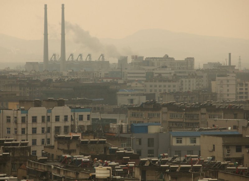 Heavy pollution hangs over Xiangfan, Hubei Province, March 22, 2011. China, the world's largest emitter of green house gases, continues to suffer the downsides of its rampant economic growth despite a raft of new environmental initiatives. UPI/Stephen Shaver | <a href="/News_Photos/lp/6f2adfdb935e51e4ad7e69e5eb40b743/" target="_blank">License Photo</a>