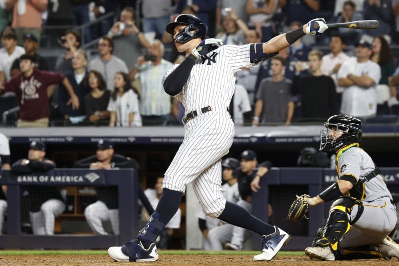 New York Yankees outfielder Aaron Judge hits his 60th home run of the season against the Pittsburgh Pirates on Tuesday at Yankee Stadium in New York. Photo by John Angelillo/UPI | <a href="/News_Photos/lp/ae593f723f457259c85263ff153d262c/" target="_blank">License Photo</a>