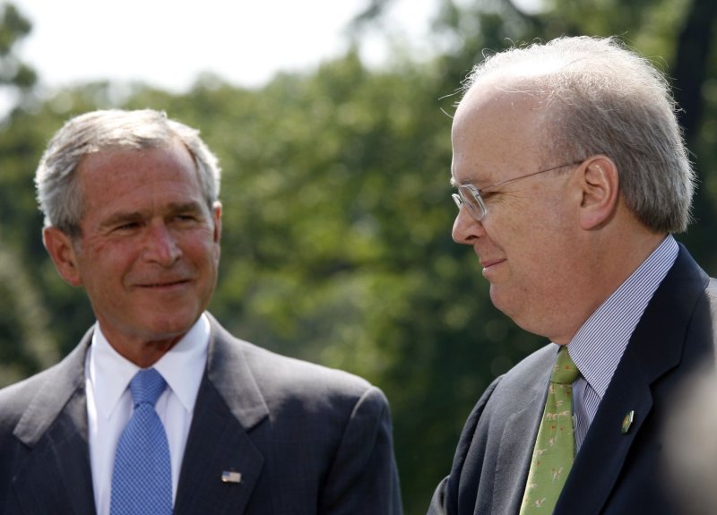 Then White House Deputy Chief of Staff Karl Rove (R) announces his resignation as U.S. President George W. Bush listens on the South Lawn of the White House on August 13, 2007. Rove is widely credited with being the architect of Bush's Presidential election victories. (UPI Photo/Aude Guerrucci/POOL).