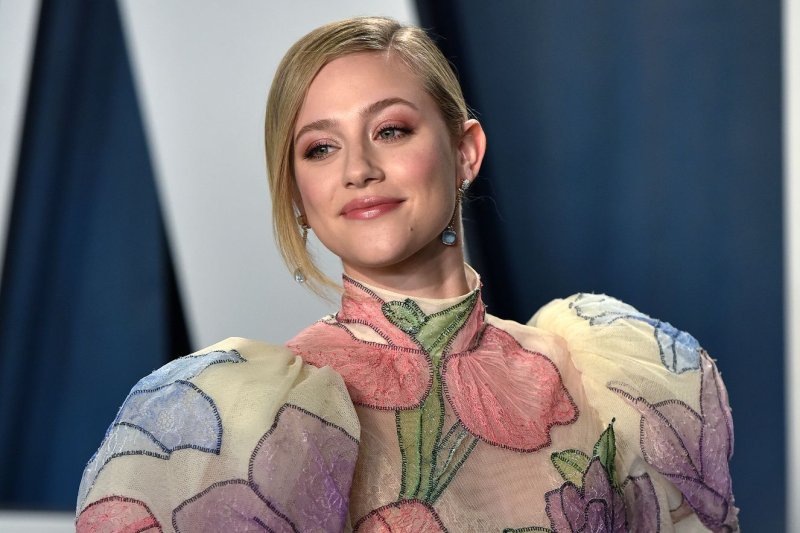 Lili Reinhart (pictured), Camila Mendes and Madelaine Petsch dressed up as the Sanderson sisters from "Hocus Pocus" for Halloween. File Photo by Chris Chew/UPI