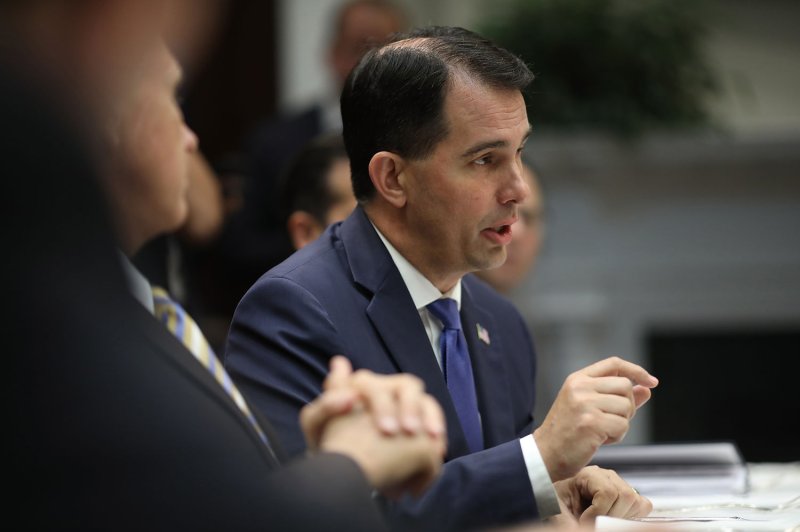 Outgoing Wisconsin Gov. Scott Walker signed multiple new laws Friday that limit the power of his Democratic successor. File Photo by Win McNamee/UPI | <a href="/News_Photos/lp/eefec6fd8e40bfb9524d3323484c71f5/" target="_blank">License Photo</a>