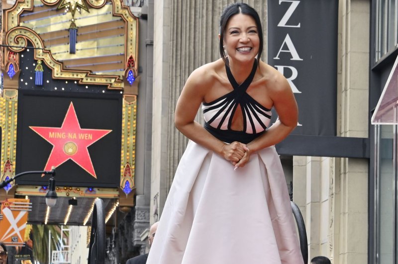 Ming-Na Wen is introduced during an unveiling ceremony honoring her with the 2,757th star on the Hollywood Walk of Fame on Tuesday. Photo by Jim Ruymen/UPI
