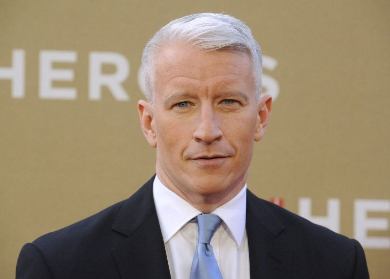 CNN host Anderson Cooper apologized for giggling during a segment about Dyngus Day festivities in Buffalo, N.Y., and said he may attend next year. Dec. 11 file photo. UPI/ Phil McCarten | <a href="/News_Photos/lp/70859de9066ad9cf7c5994897f383bc8/" target="_blank">License Photo</a>