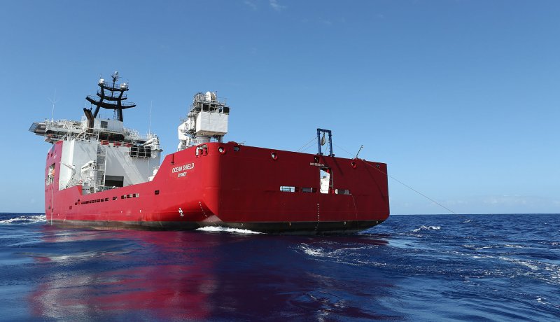 The Australian Defense Vessel Ocean Shield is among the ships searching for Malaysia Airlines MH370 missing since March 2014. The leader of the Australian investigation team said he expects the plane to be found by July. Bradley Darvill/Australian Defense Force/UPI | <a href="/News_Photos/lp/6770839933a30055707e3d5ac4db2926/" target="_blank">License Photo</a>