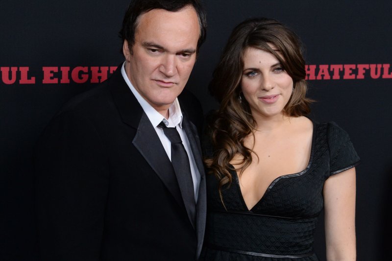 Director and writer Quentin Tarantino and his girlfriend, costume designer Courtney Hoffman, attend the premiere of "The Hateful Eight" in Los Angeles on December 7, 2015. Photo by Jim Ruymen/UPI