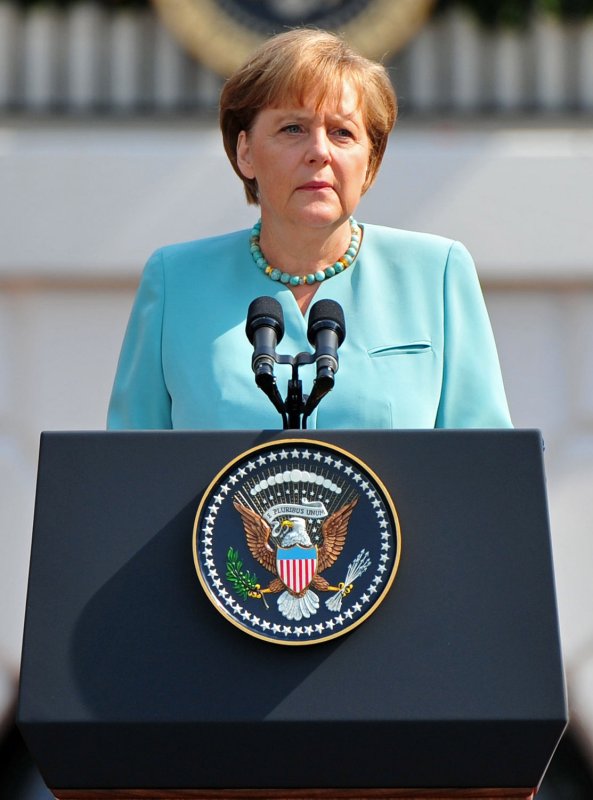 German Chancellor Angela Merkel delivers remarks during an official arrival ceremony on the South Lawn of the White House in Washington on June 7, 2011. UPI/Kevin Dietsch