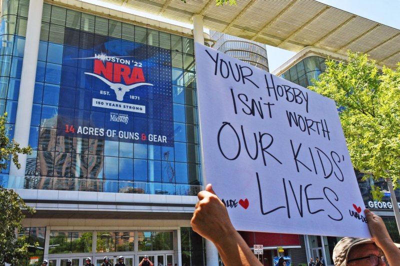 Protesters gather at the NRA Annual Meeting at the George R. Brown Convention Center in Houston on Friday. The House Judiciary Committee will consider legislation Wednesday that would toughen gun regulation in the wake of two recent mass shootings. Photo by Jon Farina/UPI