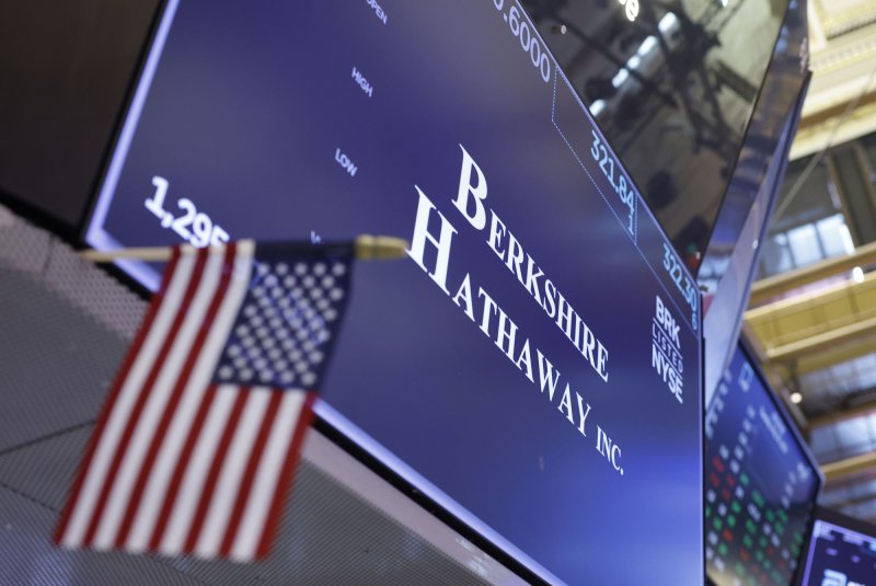 The Berkshire Hathaway logo is posted on a screen on the floor of the New York Stock Exchange on Wall Street in New York City on May 30. File photo by John Angelillo/UPI