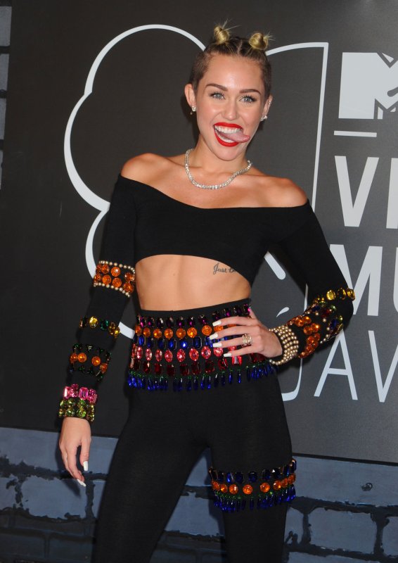 Miley Cyrus arrives on the red carpet at the 2013 MTV Video Music Awards at Barclays Center in New York City on August 25, 2013. This is the first time the awards show has been held in Brooklyn and Barclays Center which opened last September. UPI/Dennis Van Tine