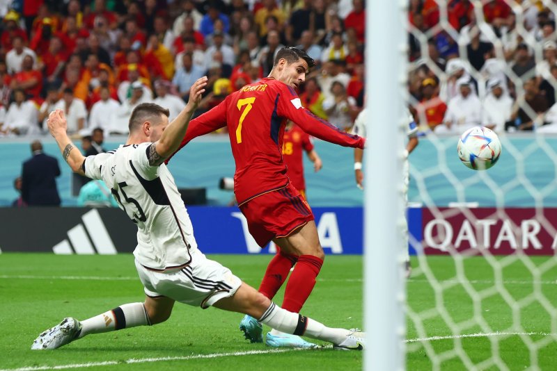 Alvaro Morata (R) of Spain scores the opening goal during the 2022 FIFA World Cup Group E match at Al Bayt Stadium in Doha, Qatar on Sunday. Photo by Chris Brunskill/UPI