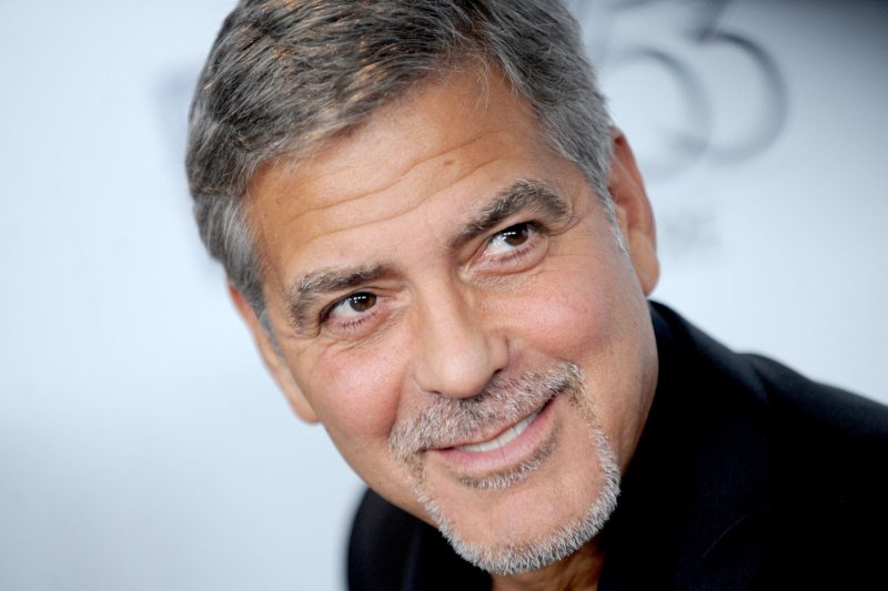 George Clooney arrives on the red carpet at the 15th anniversary screening of "O Brother, Where Art Thou?" during the 53rd New York Film Festival at Alice Tully Hall on Sept. 29. File Photo by Dennis Van Tine/UPI