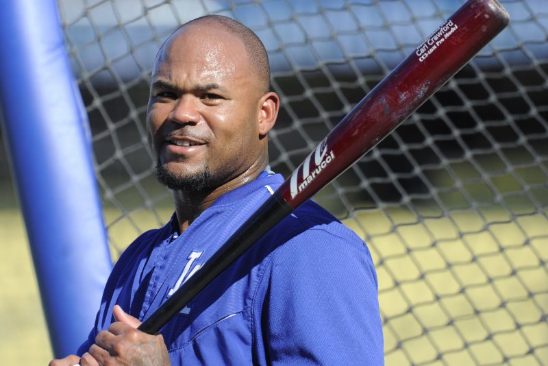 Los Angeles Dodgers' Carl Crawford takes batting practice in the heatwave before game 2 of the National League Division Series against the New York Mets at Dodger Stadium in Los Angeles on October 9, 2015. UPI/Lori Shepler | <a href="/News_Photos/lp/cca4c9ef8b415152574371b42ae26313/" target="_blank">License Photo</a>