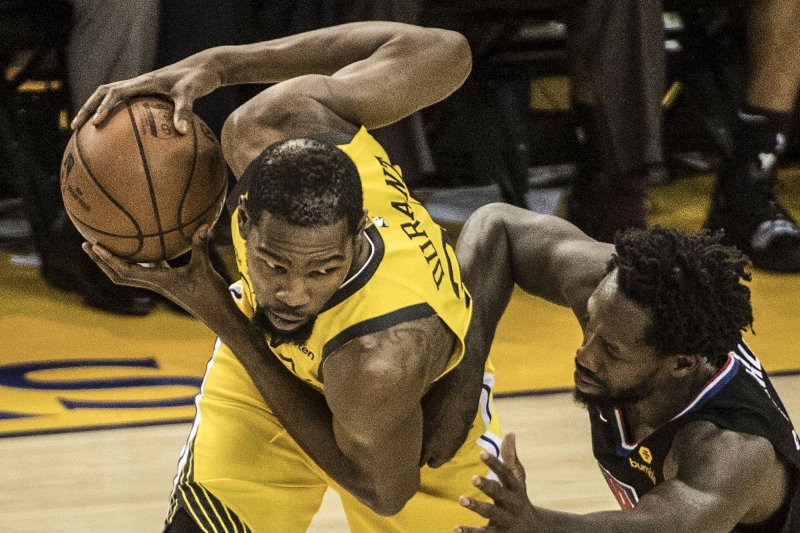 Former Golden State Warriors forward Kevin Durant (35) has yet to play this season with the Brooklyn Nets as he continues to recover from a major Achilles injury. File Photo by Terry Schmitt/UPI