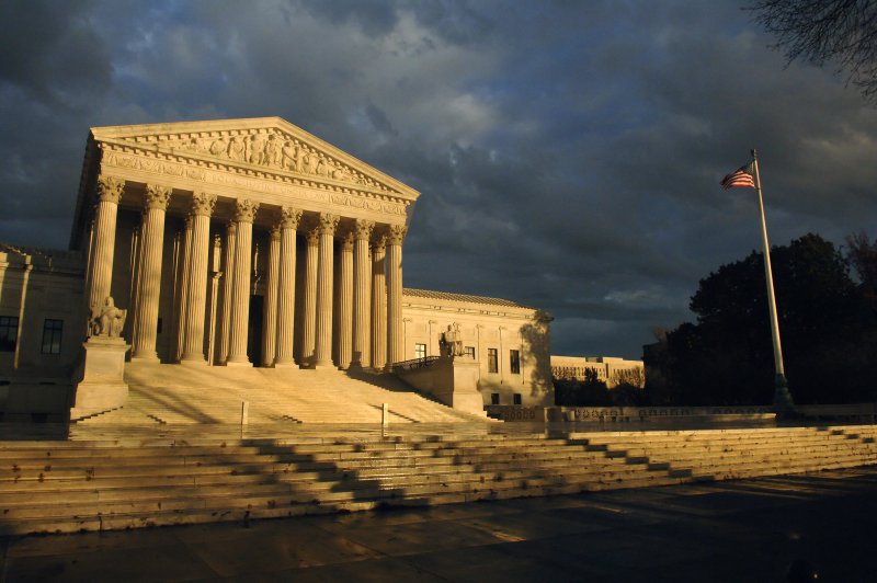 Storm clouds blow over the United States Supreme Court as the sun sets over Washington, D.C. File photo by Kevin Dietsch/UPI