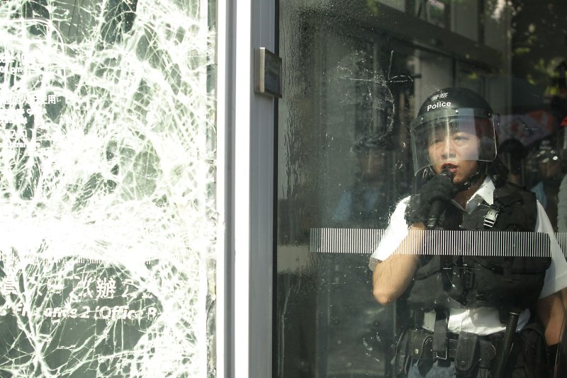 China urges punishment of Hong Kong protesters for building breach