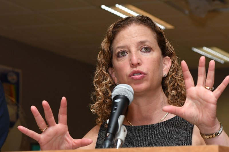 A staffer for Rep. Debbie Wasserman Schultz was arrested Monday night while trying to leave the country, and charged with bank fraud. File Photo by Gary I Rothstein/UPI | <a href="/News_Photos/lp/e224a2f271eac1dc894bd860d8fbda37/" target="_blank">License Photo</a>